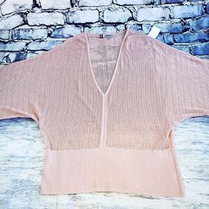 Jennifer Lopez pink peekaboo crochet silver thread kimono sleeves